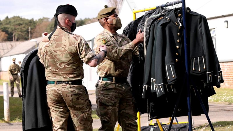Soldiers inspect uniforms being prepared for the funeral of Prince Philip, The Duke of Edinburgh