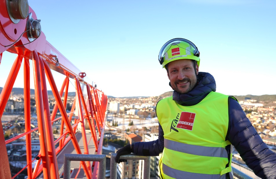 Crown Prince Haakon Magnus of Norway enjoys a visit to the top of a crane on one of Oslo's biggest building sites.