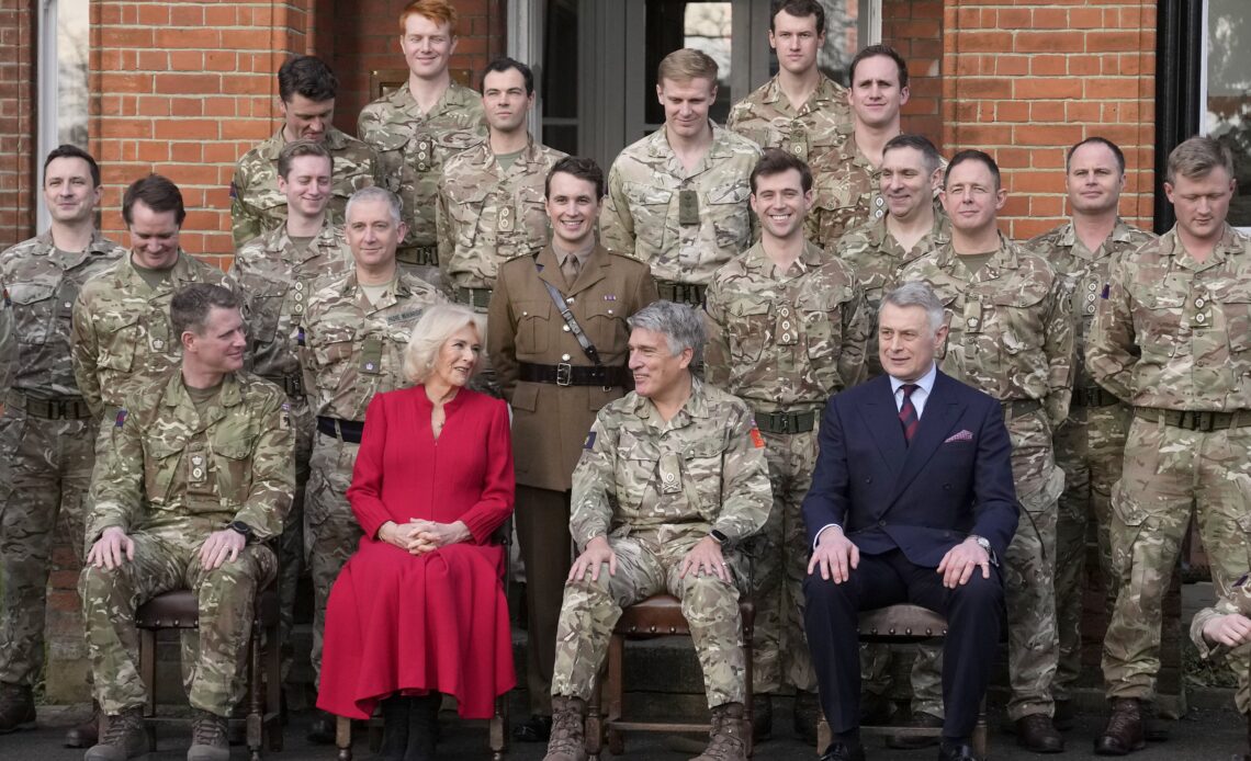 Her Majesty Queen Camilla talks to soldiers during her visit to the Grenadier Guards. It was Her Majesty's first visit since becoming their Colonel