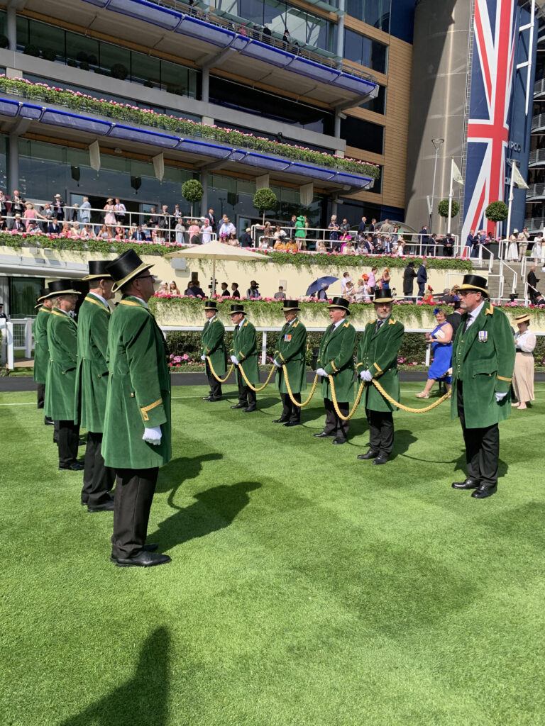 The Greencoats line up at Royal Ascot forming a striking guard of honour in the heart of the Royal Enclosure