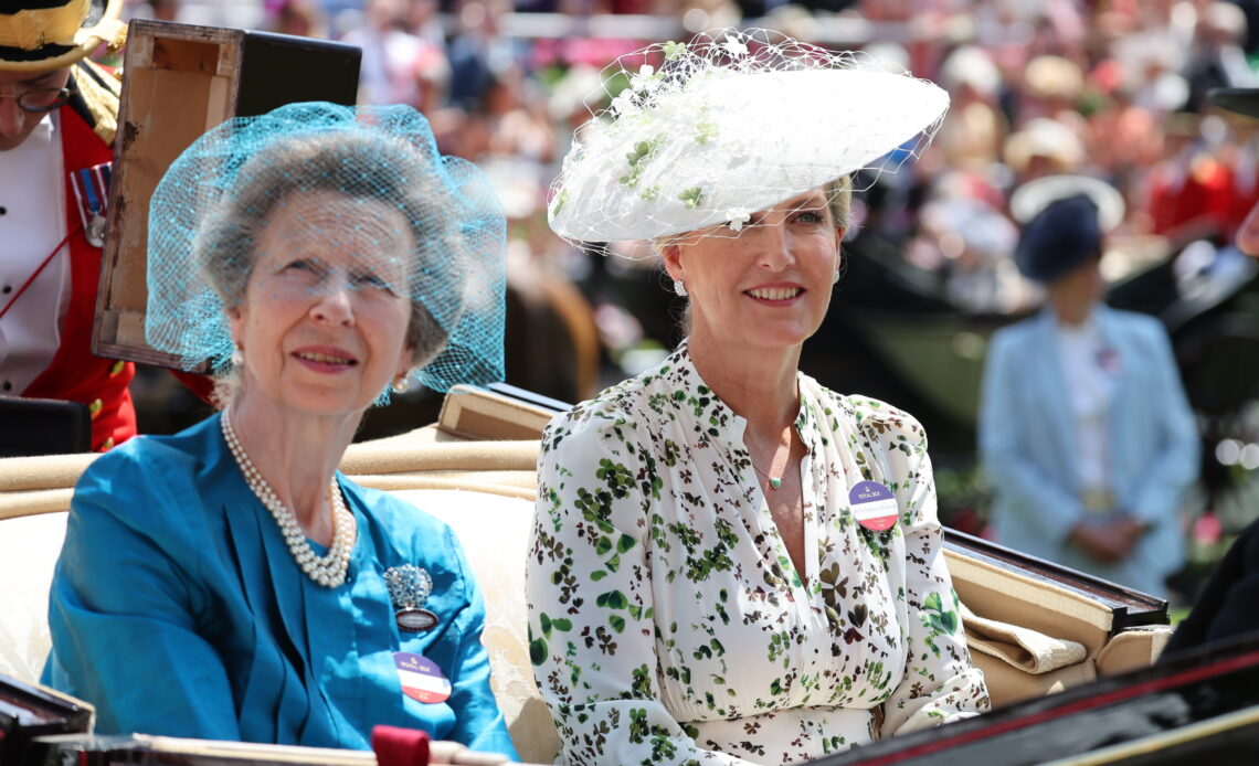 The Duchess of Edinburgh and the Princess Royal arrive at Royal Ascot on Ladies Day. Both chose veiled hats for the glamourous occasion with Sophie in bridal white and Anne in jade green. Their jewels also took a star role with Anne wearing a gift from her late grandmother, the Queen Mother.