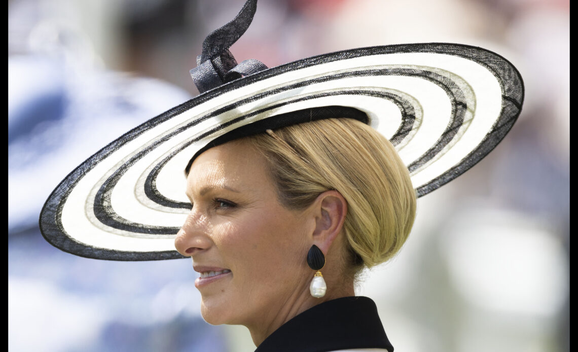 Zara Tindall chose a striking black and white striped boater style hat for Ladies Day at Royal Ascot in 2025.