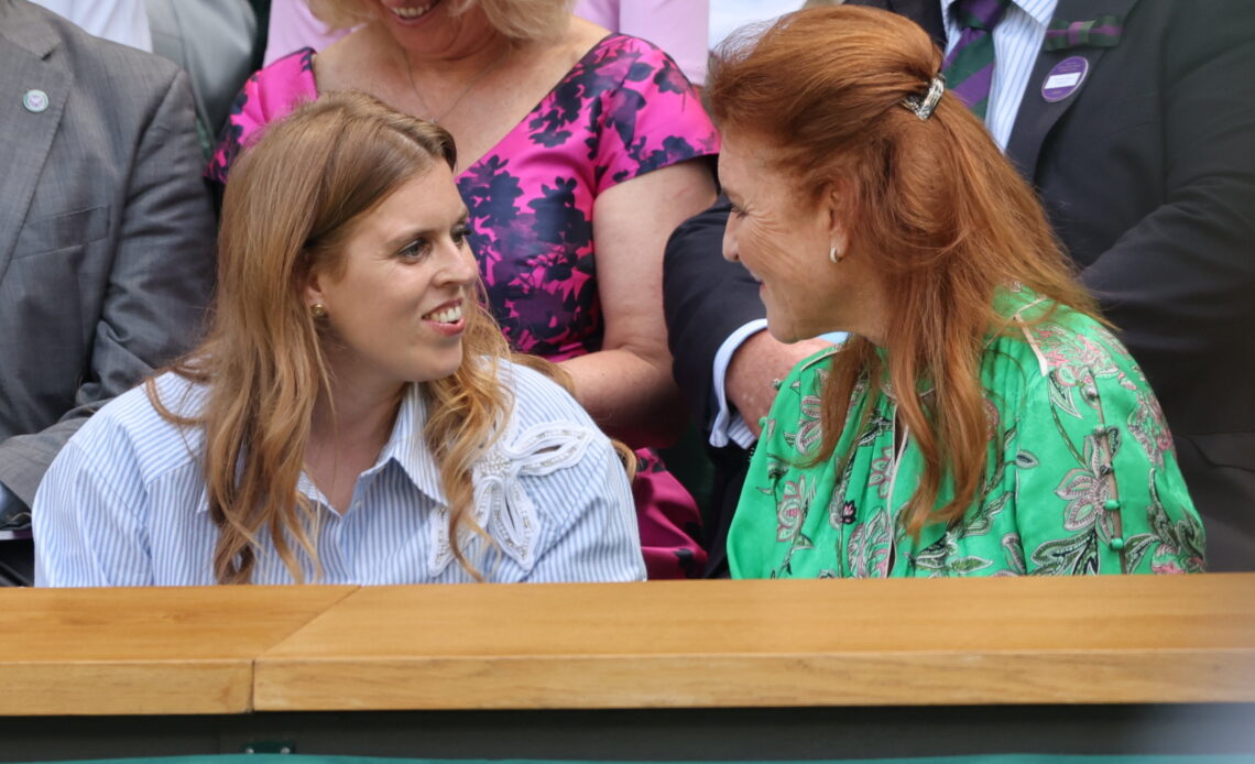 Princess Beatrice, in a cool blue striped shirt dress, is joined by her mother, Sarah, Duchess of York, in the royal box on the opening day of Wimbledon 2025.