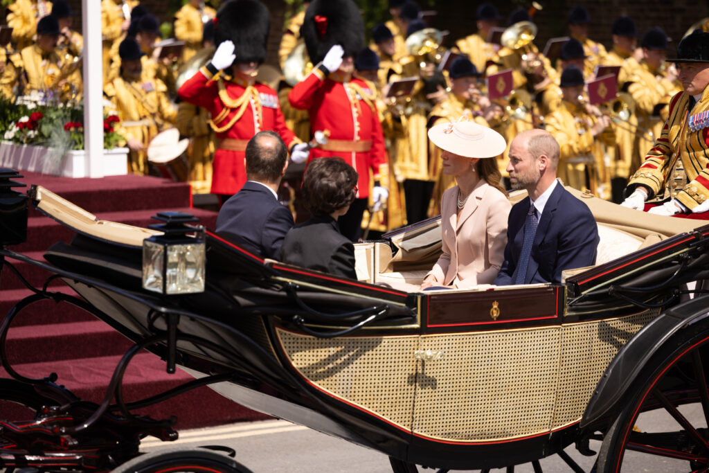 The Prince and Princess of Wales ride in an Ascot Landau at the start of the French State Visit to the UK