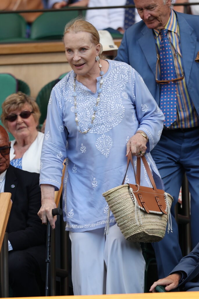 Princess Michael of Kent arrives in the royal box of Wimbledon for day three and uses a walking stick to make her way to her seat in the royal box.
