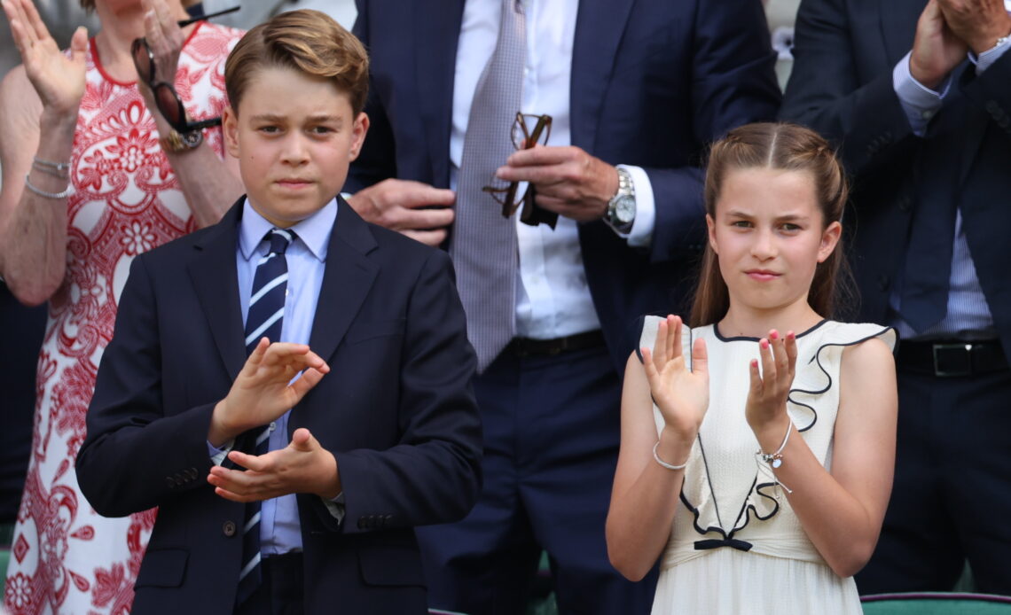 Prince George and Princess Charlotte take their seats in the royal box at Wimbledon having met British doubles champs, the first all British pair to win the title since the reign of Edward VIII.