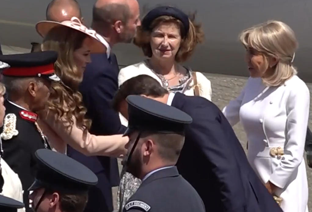 President Emmanuel Macron of France kisses the hand of the Princess of Wales as he arrives for his State Visit