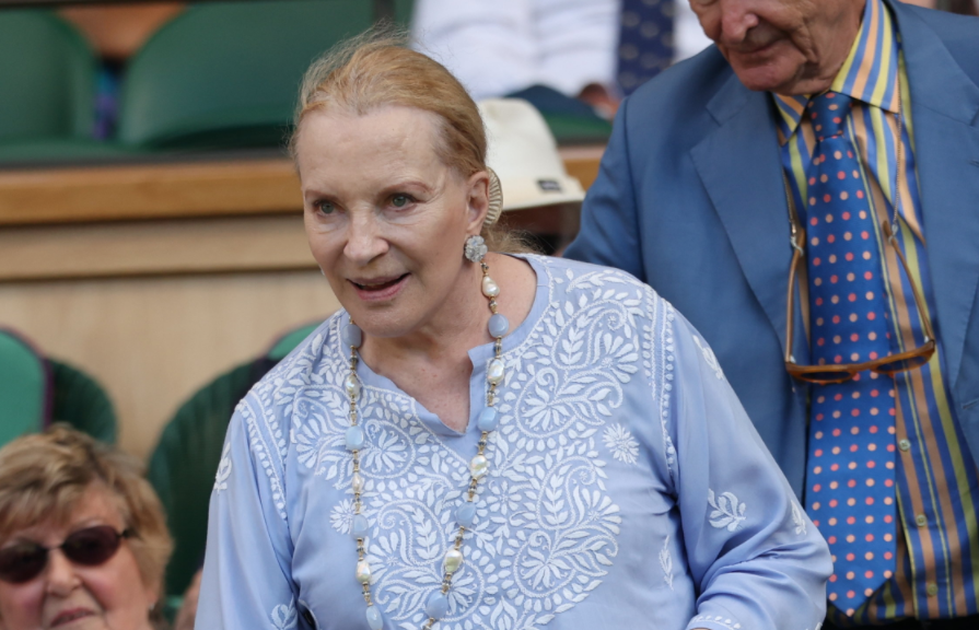 Princess Michael of Kent arrives at Wimbledon on day three of the championships. She is using a walking stick to reach her seat in the royal box.
