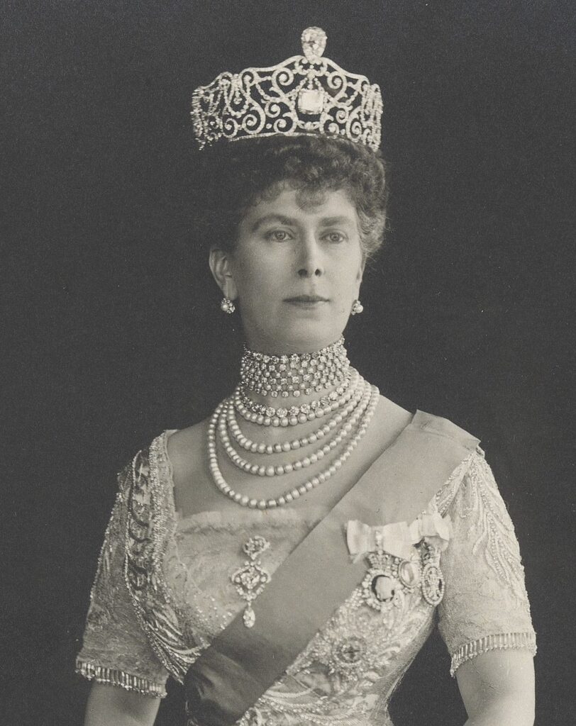 Queen Mary wears the crown lie Delhi Durbar tiara for an official portrait. In this setting it contains two of the Cullinan diamonds