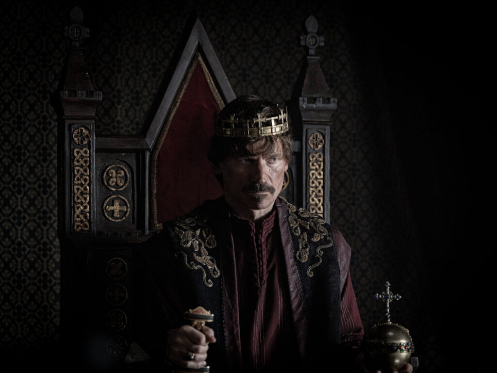 A still from King and Conqueror showing William the Conqueror crowned