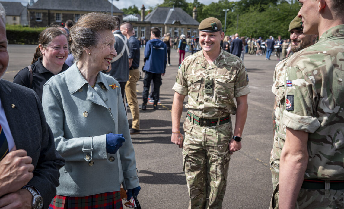 Princess Anne, The Princess Royal talks to soldiers during rehearsals for the Edinburgh Military Tattoo which turns 75 in the same year as her.