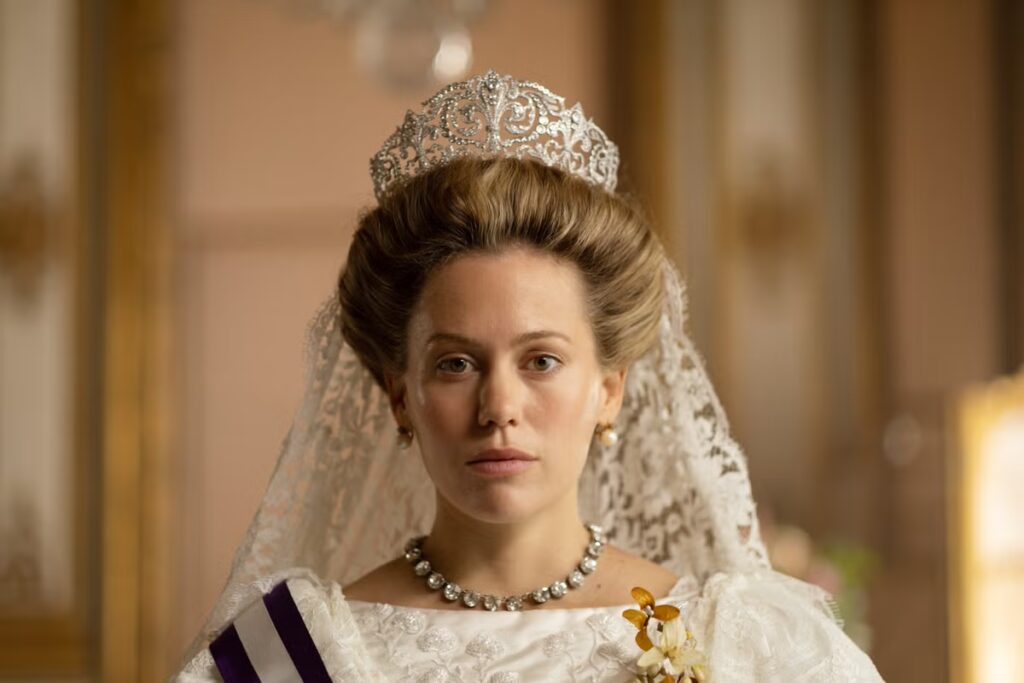 Tragic queen gets TV treatment Kimberley Tell as Queen Victoria Eugenia of Spain in TV show Ena. She wears a wedding dress and huge tiara.