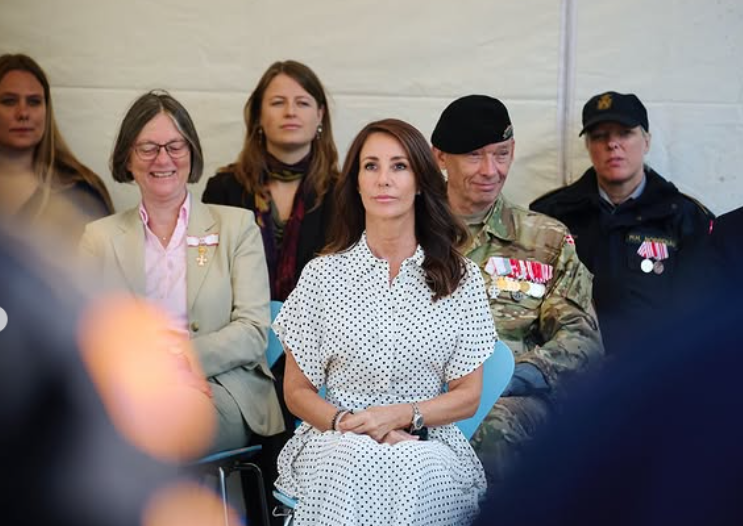 Princess Marie watches a parade