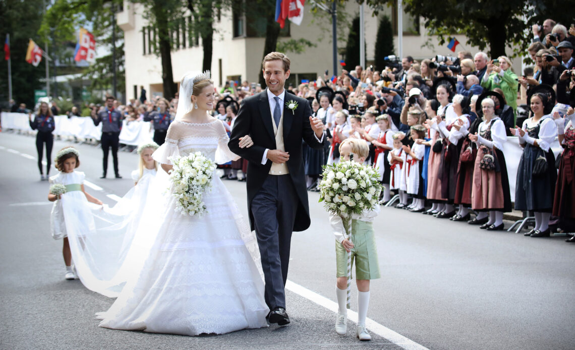 Princess Marie Caroline of Luxembourg and Leopoldo Maduro Vollmer walk from the church after their wedding in Vaduz