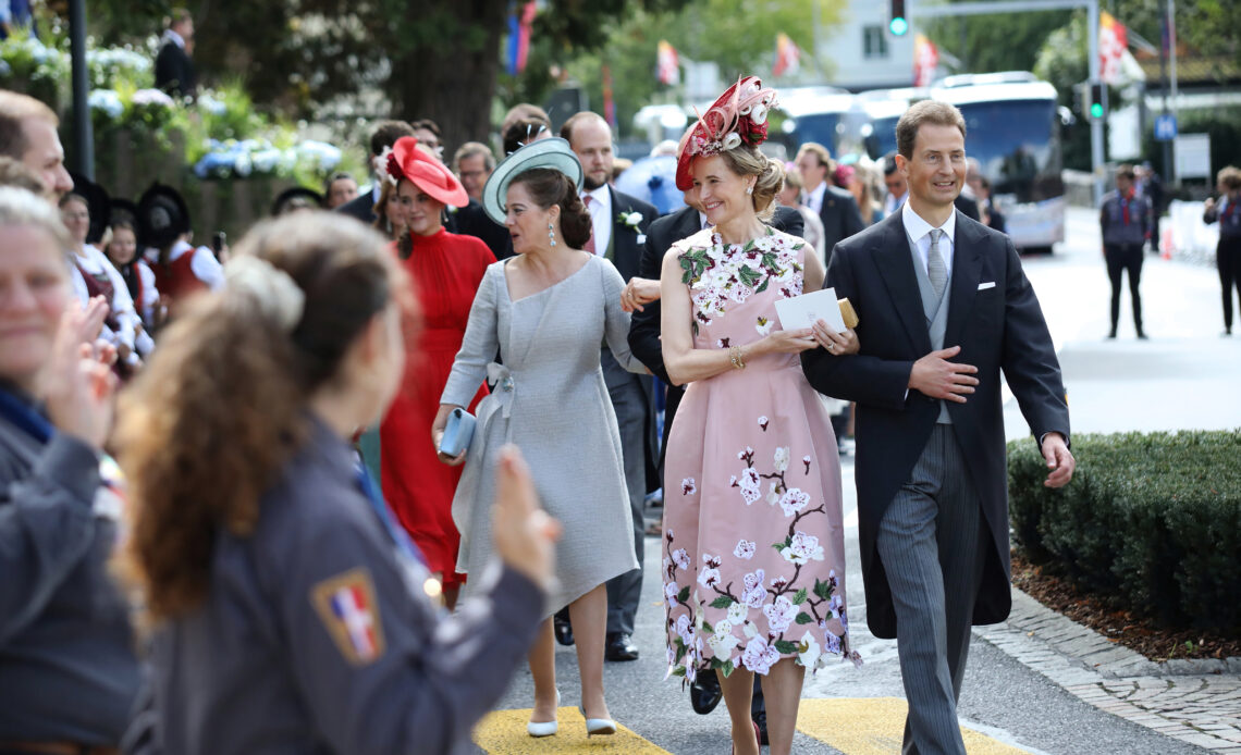 Prince Alois and Princess Sophie of Liechtenstein walk from the church after the wedding of their daughter, Princess Marie Caroline