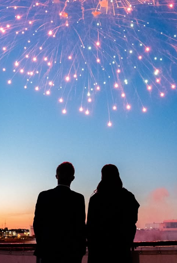 King Frederik and Queen Mary look at the stars during an evening reception