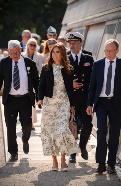 Queen Mary wears a floral dress for a walk through Thisted