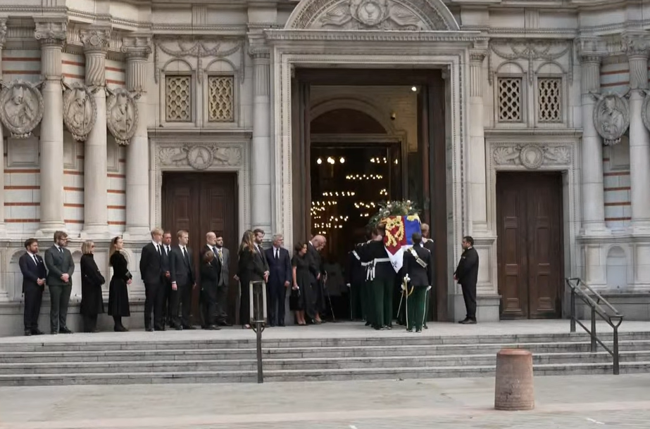 The coffin of the Duchess of Kent is carried into Westminster Cathedral