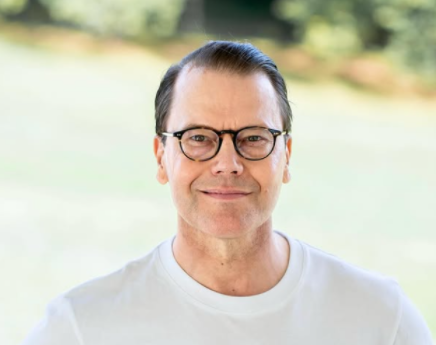 Prince Daniel of Sweden wearing a white T-shirt and glasses for a birthday portrait