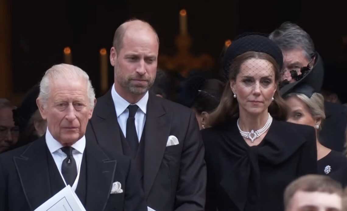 King Charles stands on the steps of Westminster Cathedral with the Prince and Princess of Wales after the funeral of the Duchess of Kent