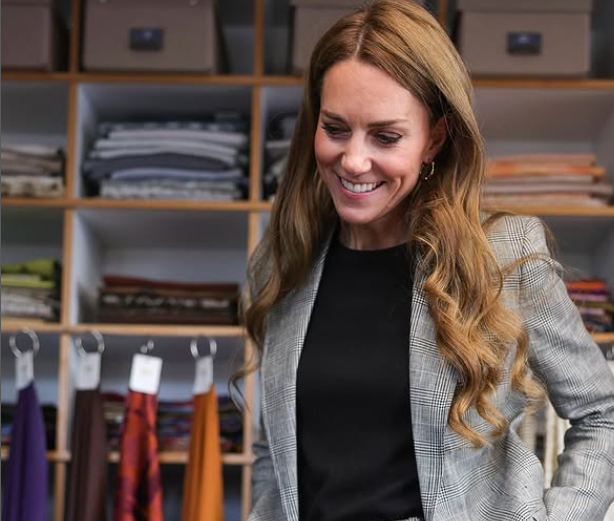 Kate, The Princess of Wales wears a Prince of Wales check blazer with black top as she visits a mill in Suffolk