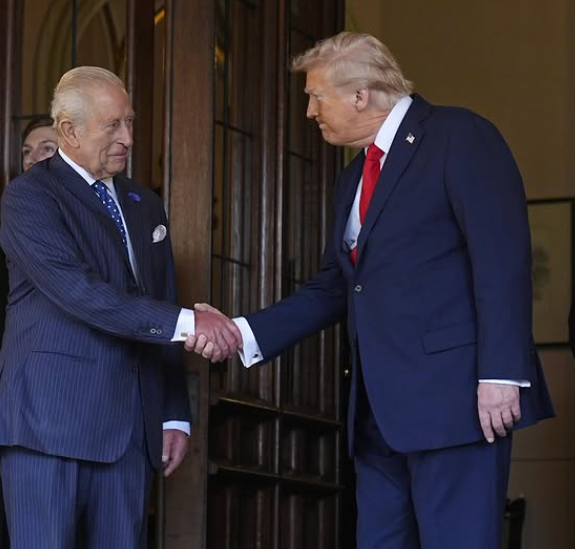 King Charles shakes hands with Donald Trump as they bid one another farewell at the end of the US State Visit at Windsor Castle