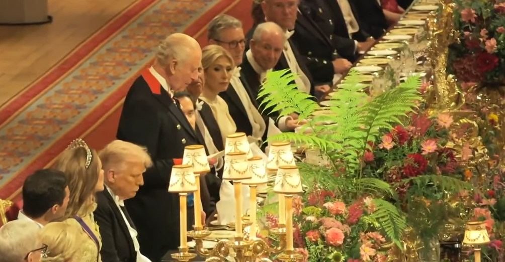 King Charles stands to make a speech at the State Banquet for Donald Trump at Windsor Castle