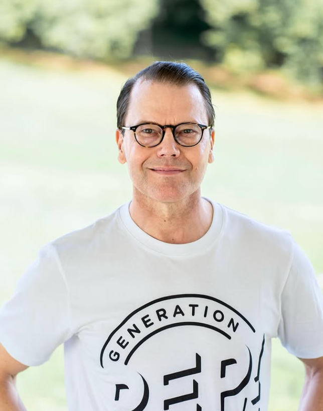 Prince Daniel of Sweden wears a white T-shirt with black logo as he marks his birthday