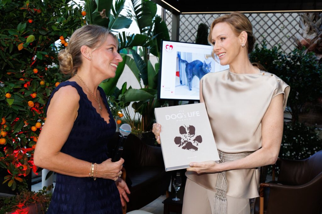 Princess Charlene celebrates the dogs of Monaco at book launch