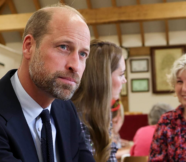 Prince William and the Princess of Wales speak to members of the WI