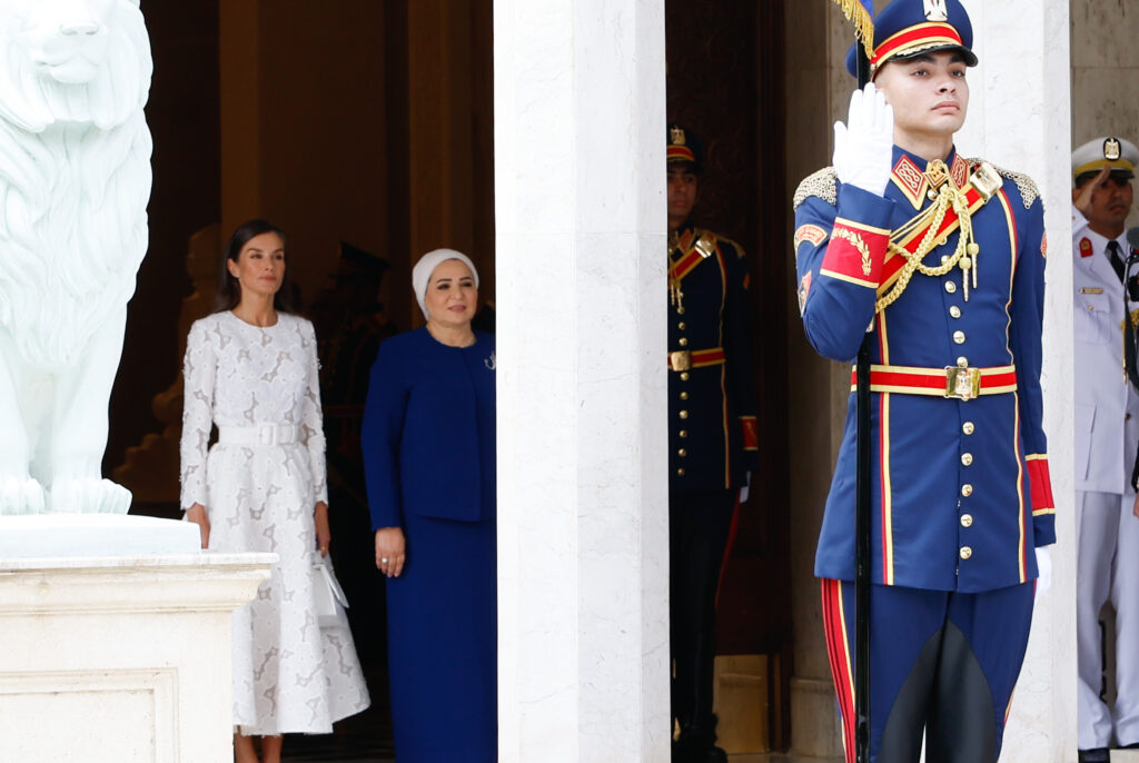 Queen Letizia of Spain walks past a pillar on her visit to Egypt