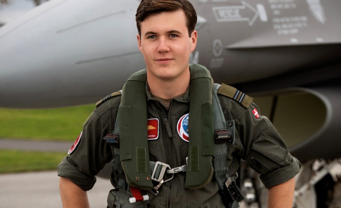 Crown Prince Christian posing with F-16