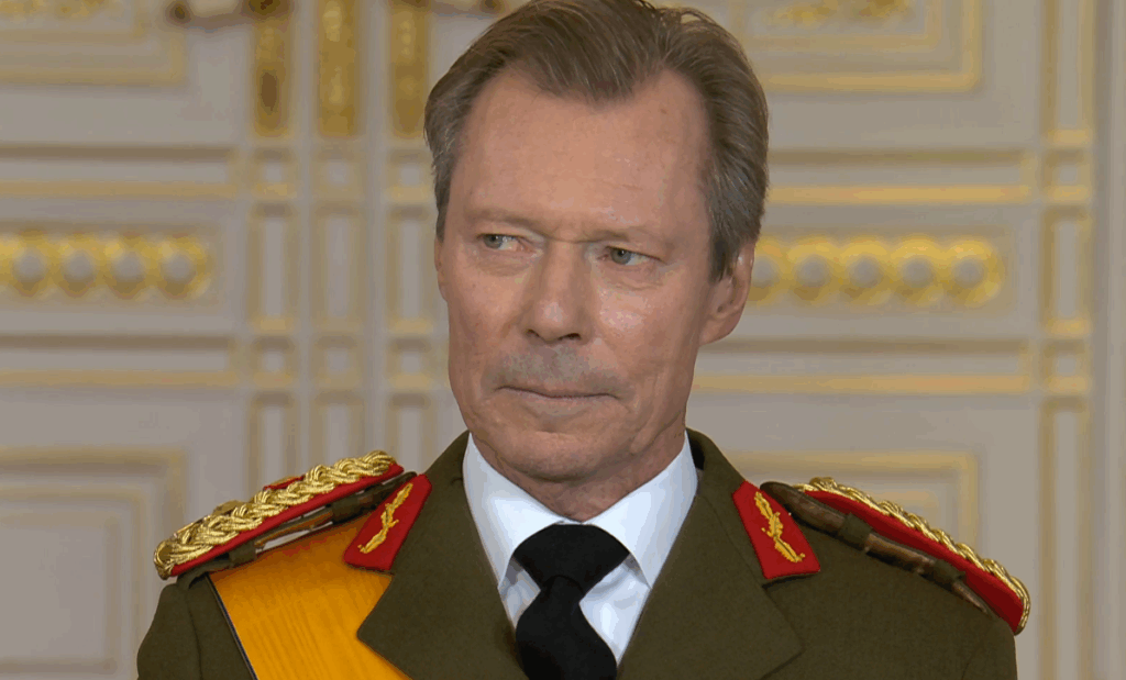 Grand Duke Henri struggles to hold back tears as the Prime Minister of Luxembourg thanks him for 25 years of service