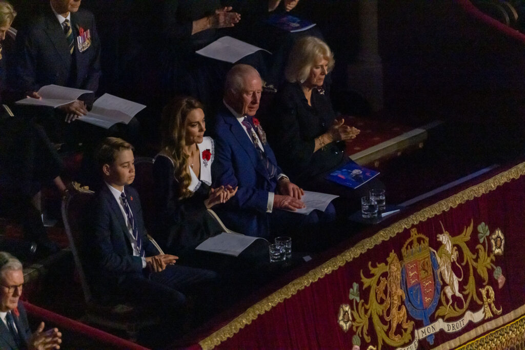 Prince George sits with The King, The Queen and the Princess of Wales at the Royal Albert Hall for the Festival of Remembrance