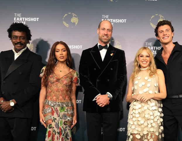 Prince William stands next to Kylie Minogue and Shawn Mendes