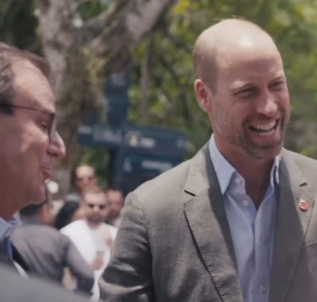 Prince William laughs as he arrives in Rio