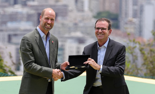 Prince William holds a velvet lined box containing a golden key, a symbol of the keys to Rio which he was given by the city's mayor