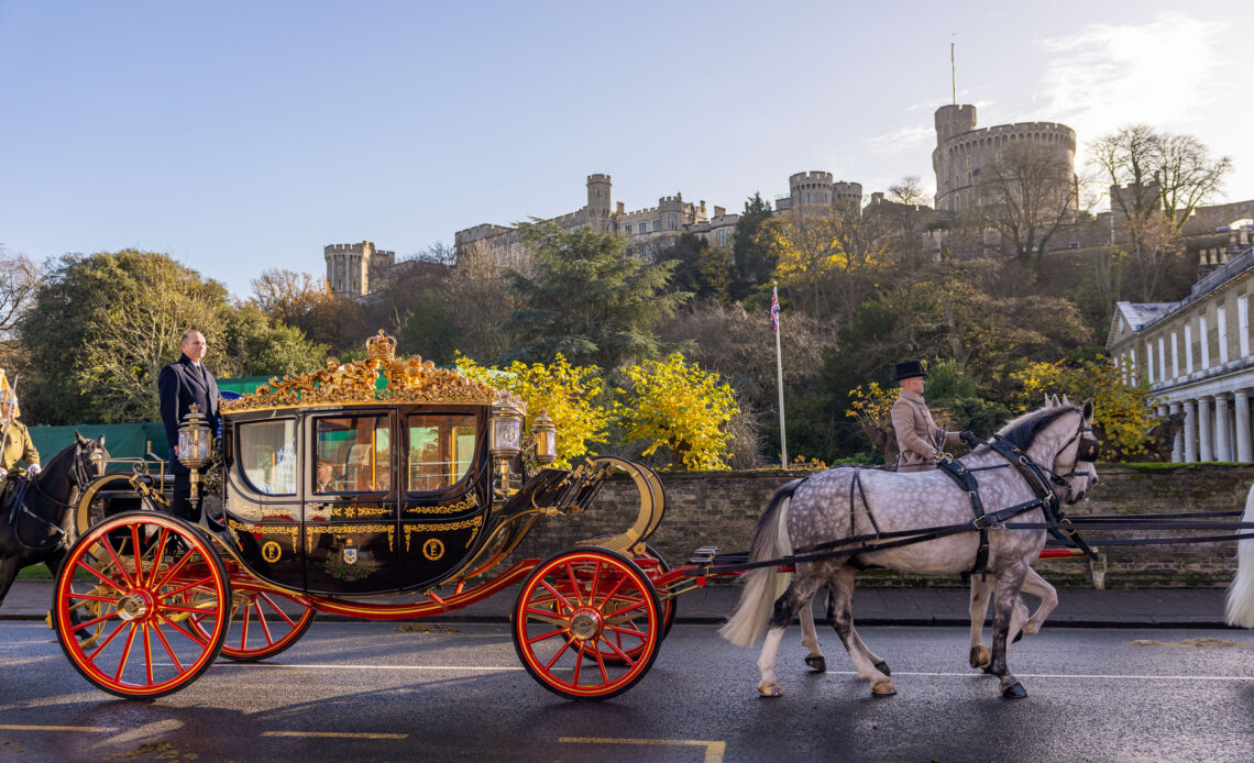 The Australian State Coach rides through Windsor