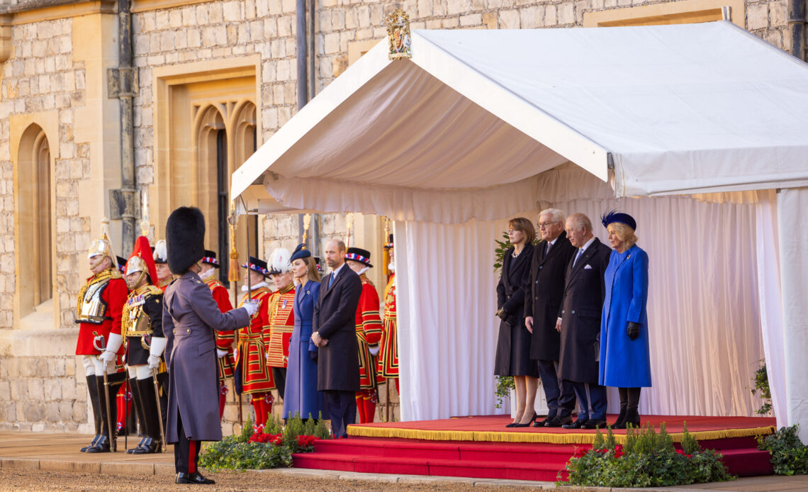 A soldier talks to King Charles