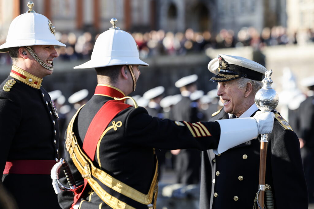 King Charles laughs as he tours Dartmouth naval college