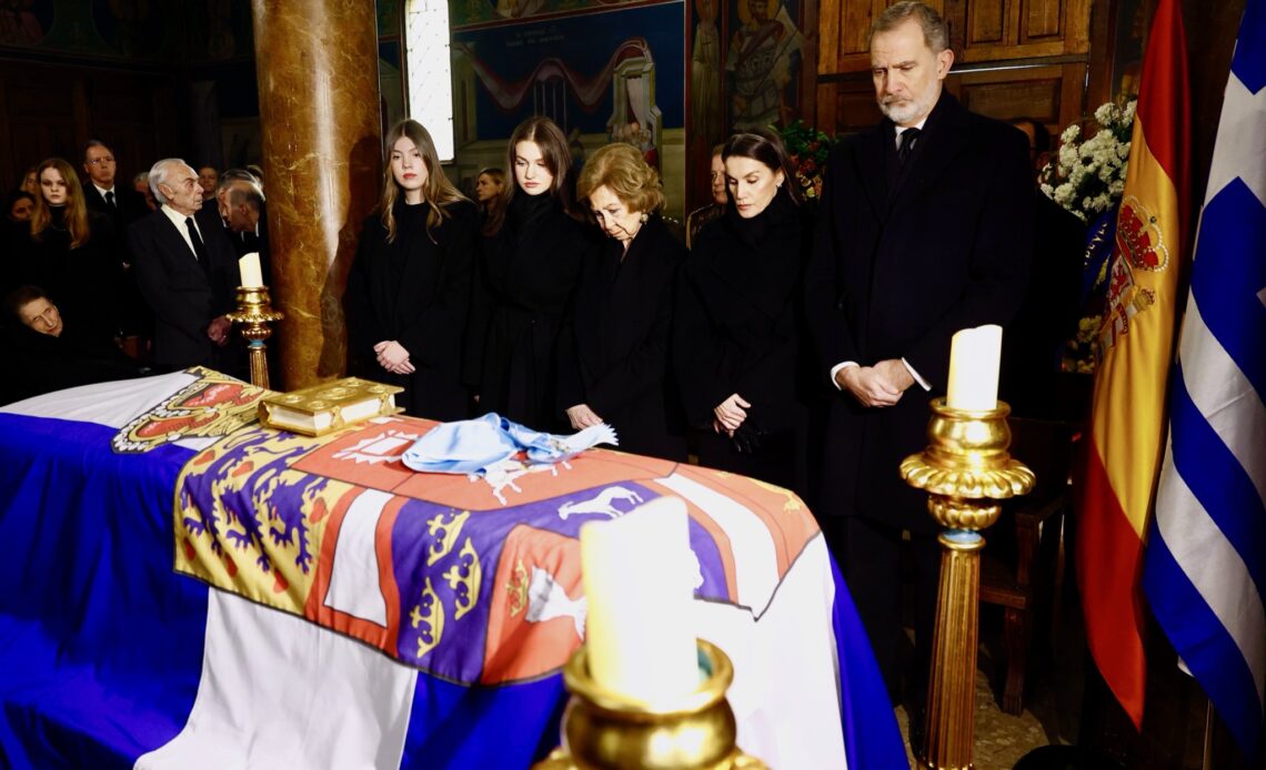 Queen Sofia bows her head before the coffin of her sister, Princess Irene