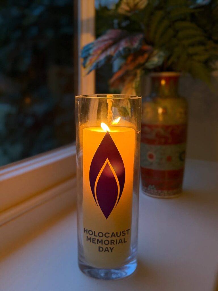 The Prince and Princess of Wales light a candle on Holocaust Memorial Day
