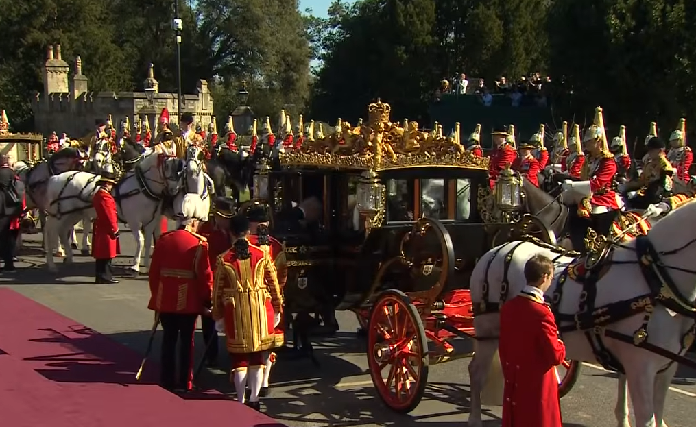 The Australian State Coach gleams golden in the sunshine as the Nigerian State Visit gets under way