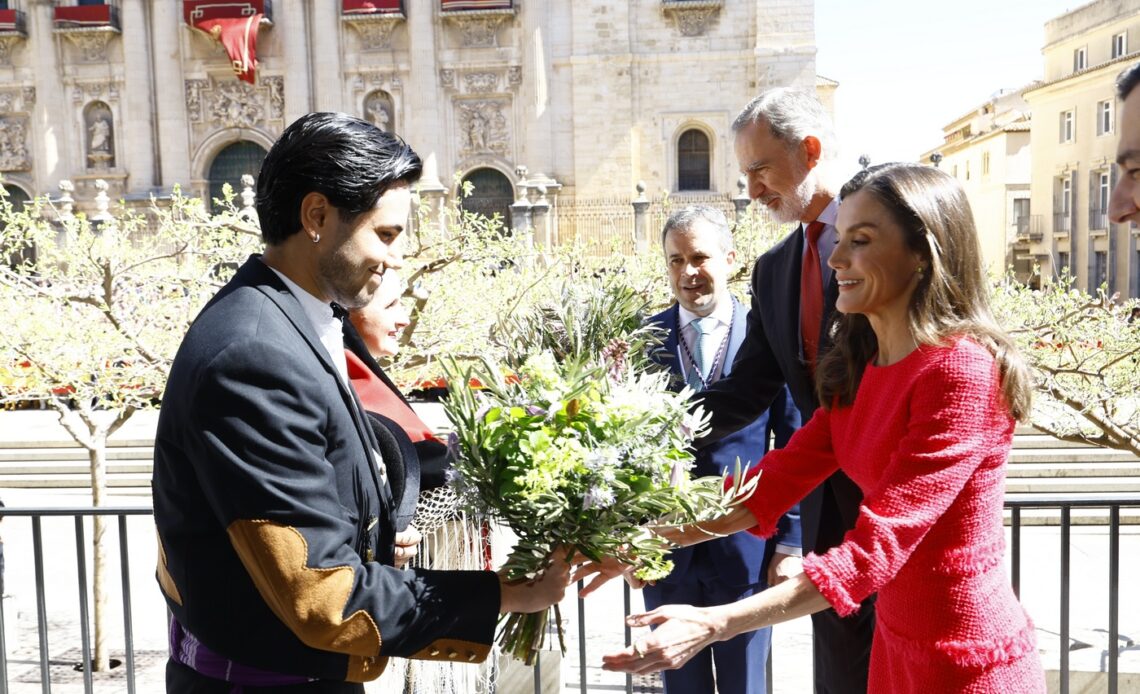 Queen Letizia receives a bunch of flowers during a visit to the city of Jaen