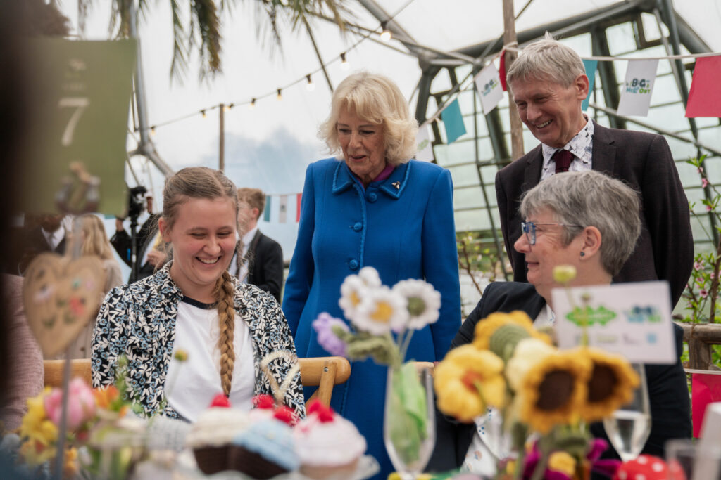 Queen Camilla talks to people enjoying the first Big Lunch of 2026
