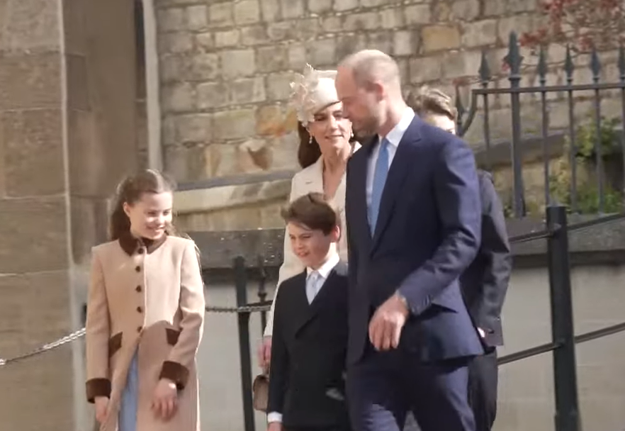 The Prince and Princess of Wales walk down the steep sloping pavement to the door of St. George's Chapel, Windsor