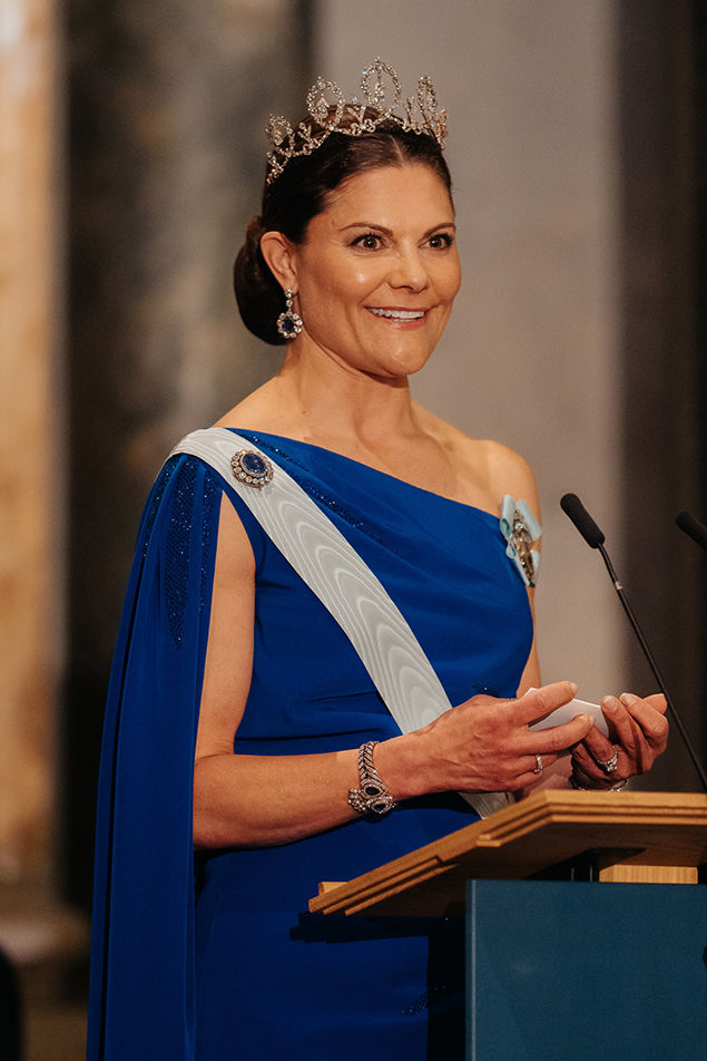 Crown Princess Victoria of Sweden wears a cobalt blue dress