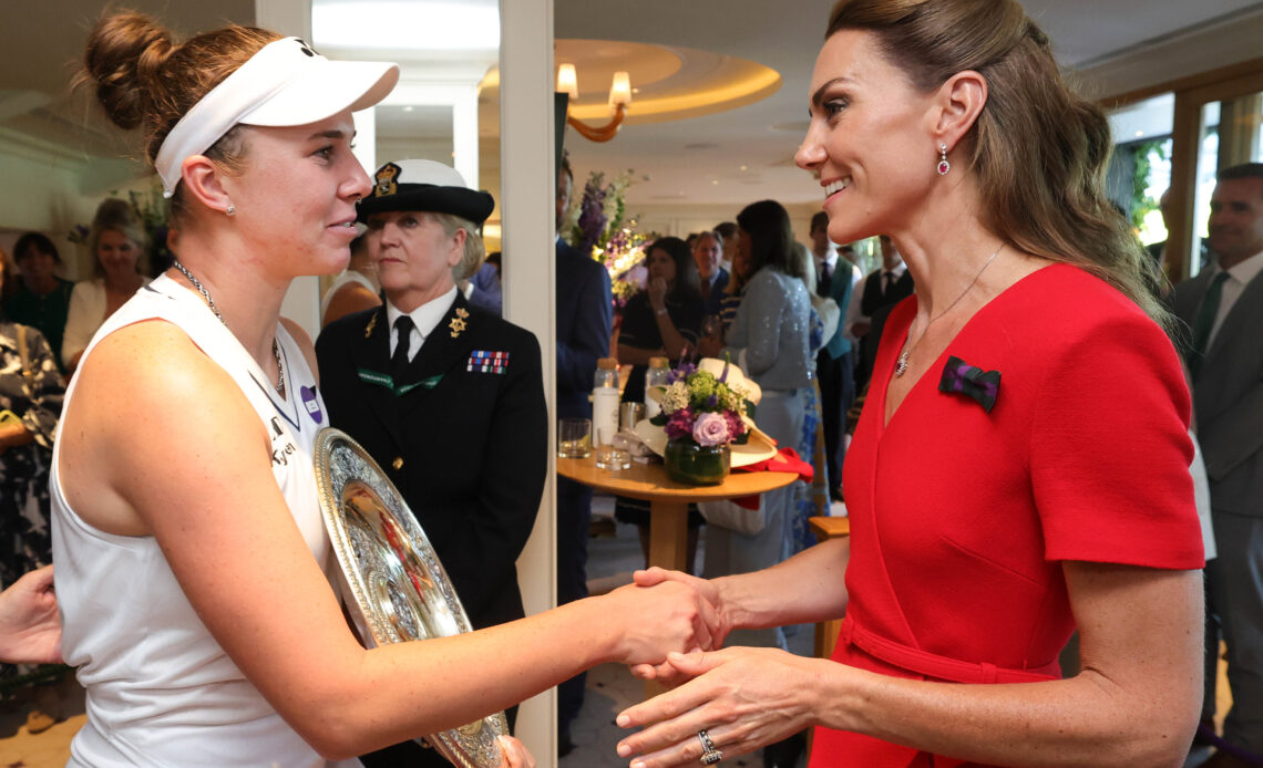 The Princess of Wales, in a red dress, shakes hands with Wimbledon champion, Linda Noskova