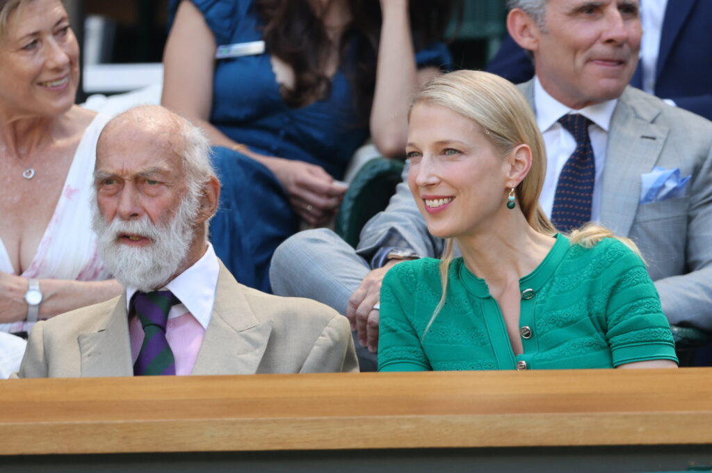 lady Gabriella Kingston, in a green dress, smiles as she watches the Men's Singles Final at Wimbledon with her father, Prince Michael of Kent