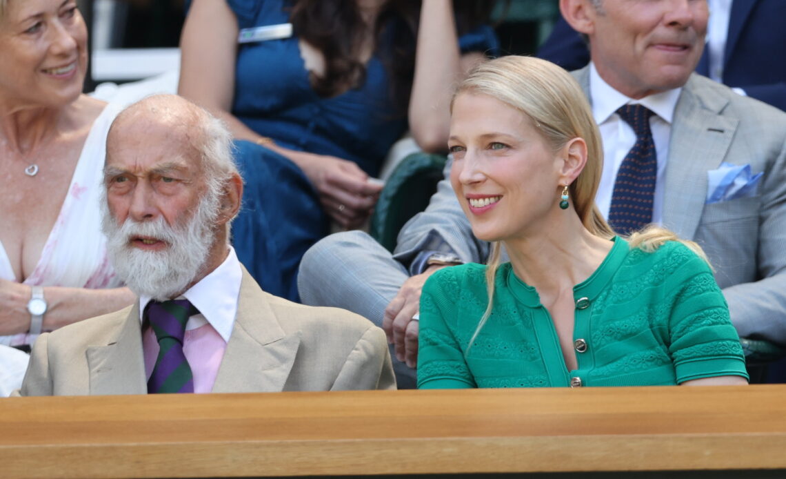 lady Gabriella Kingston, in a green dress, smiles as she watches the Men's Singles Final at Wimbledon with her father, Prince Michael of Kent